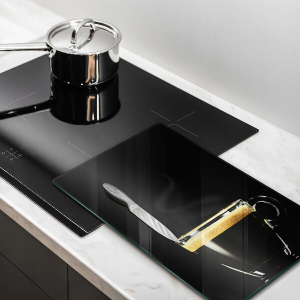 Protection plaque induction Un verre de café noir