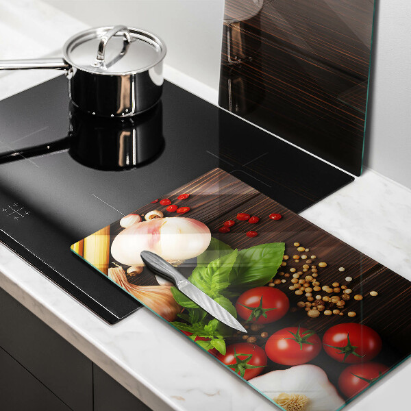 Protection plaque induction Des légumes sur la table