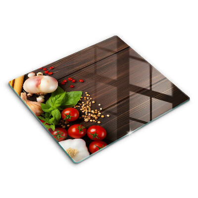 Protection plaque induction Des légumes sur la table