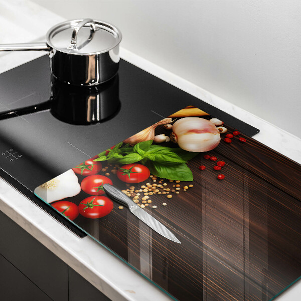 Protection plaque induction Des légumes sur la table