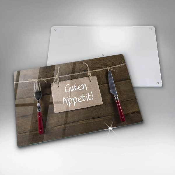 Protège plaque de cuisson Inscription Guten Appetit sur des planches de bois