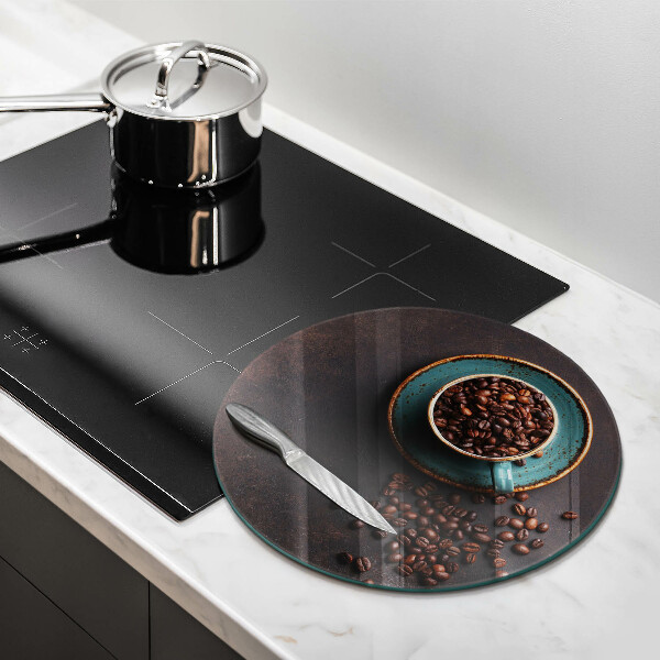 Protection plaque induction Une tasse de grains de café