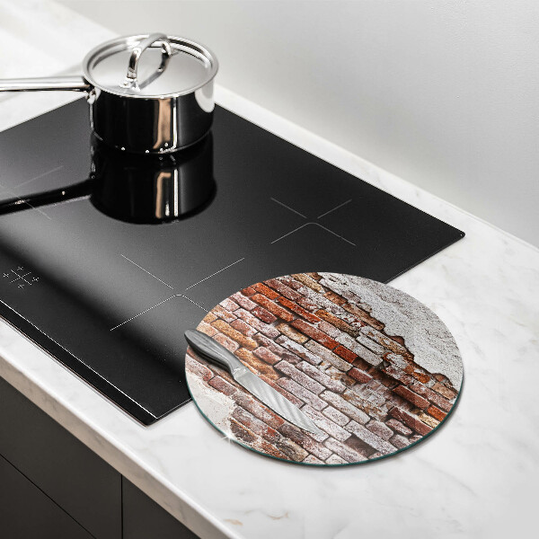 Protection plaque induction Vieux mur de brique et de béton