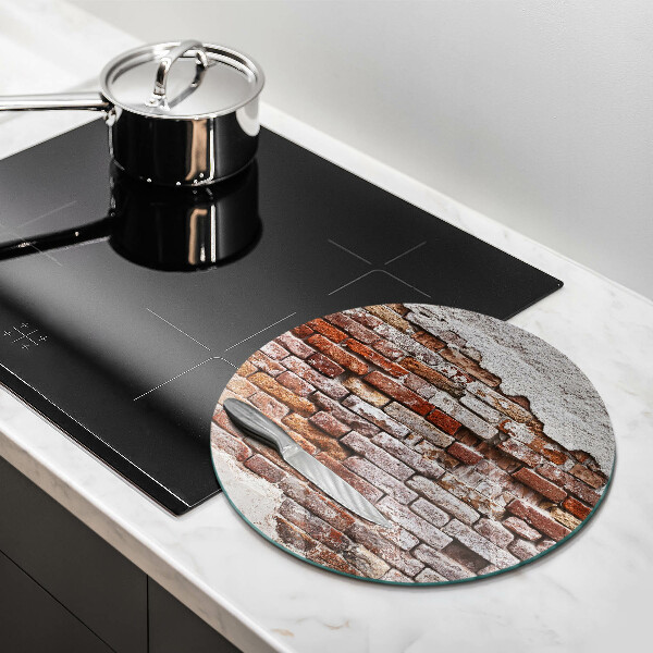 Protection plaque induction Vieux mur de brique et de béton