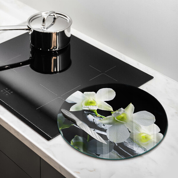 Protection plaque induction Fleurs blanches dans une eau zen