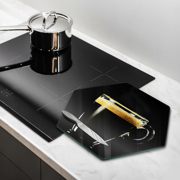 Protège plaque de cuisson Un verre de café noir