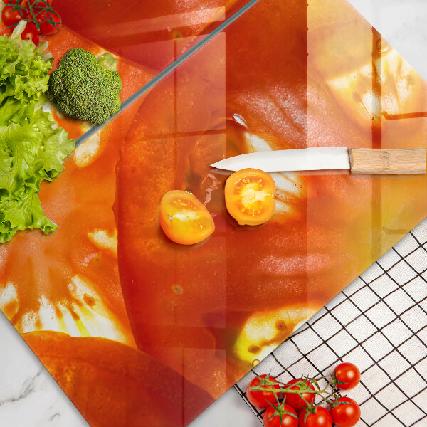 Protection plaque induction Une tranche de tomate rouge