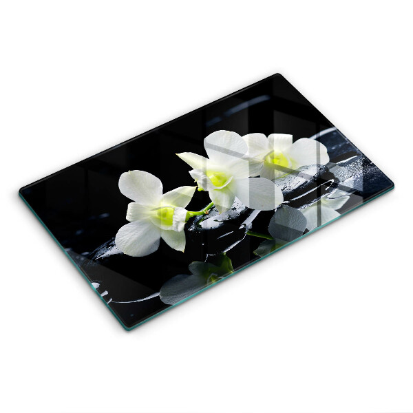 Protection plaque induction Fleurs blanches dans une eau zen