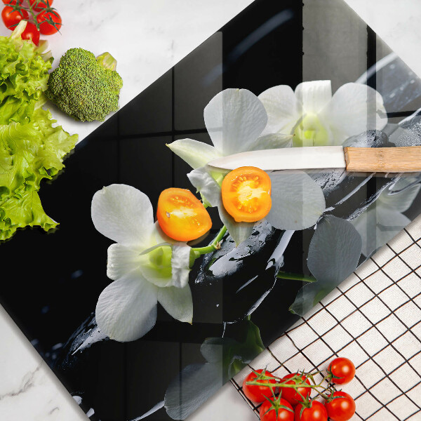 Protection plaque induction Fleurs blanches dans une eau zen