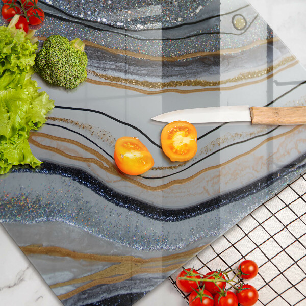 Cache plaque de cuisson rocher avec de l'or