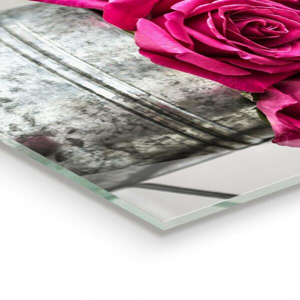 Crédence cuisine en verre Arrosoir avec un bouquet de roses