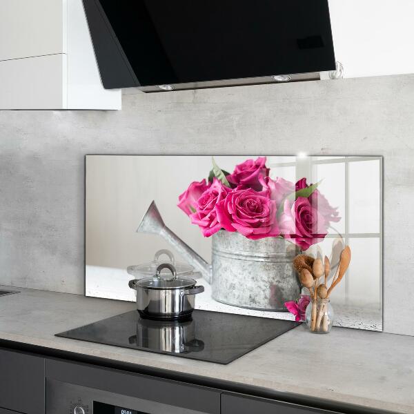 Crédence cuisine en verre Arrosoir avec un bouquet de roses