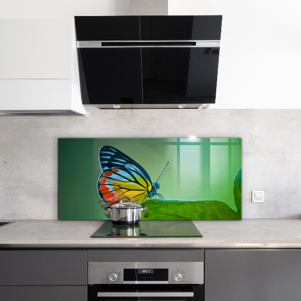 Crédence cuisine en verre Papillon posé sur une feuille