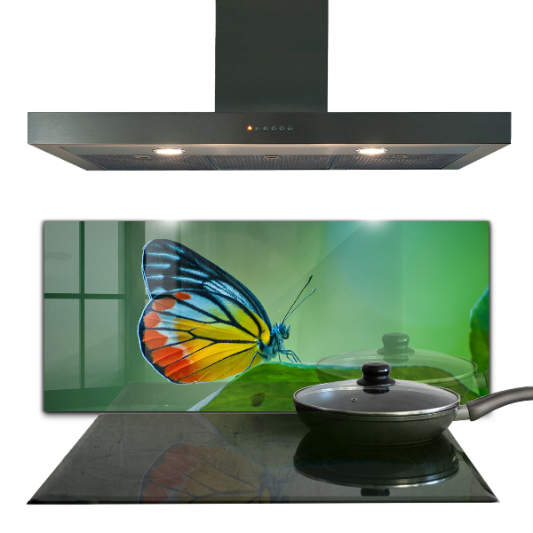 Crédence cuisine en verre Papillon posé sur une feuille