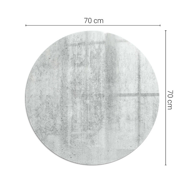 Ronde vitre sous poêle à bois texture du béton brut