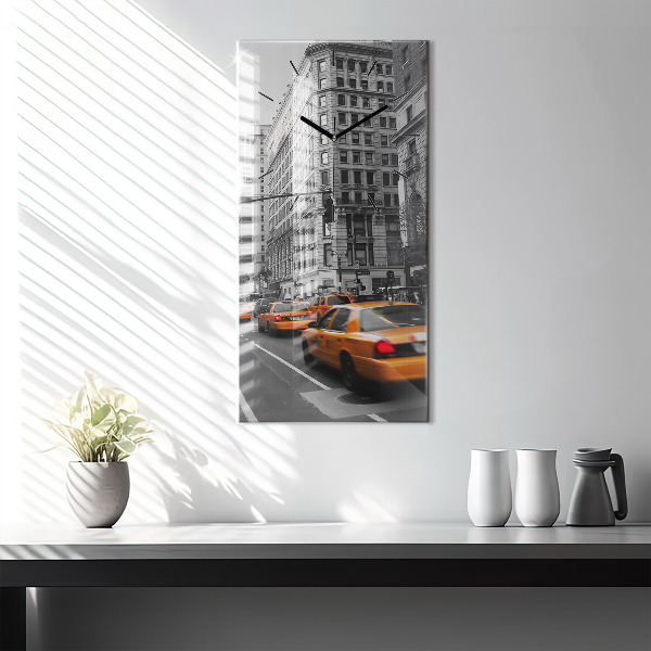 Horloge rectangulaire verticale Manhattan et les taxis