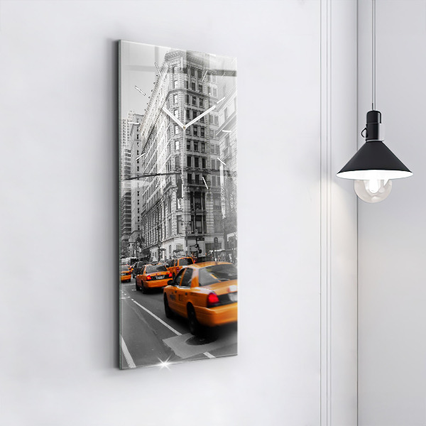 Horloge rectangulaire verticale Manhattan et les taxis