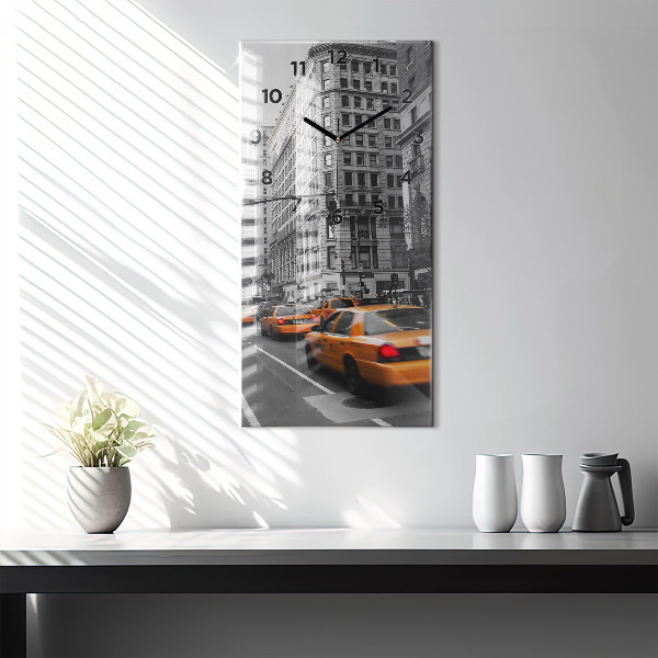 Horloge rectangulaire verticale Manhattan et les taxis