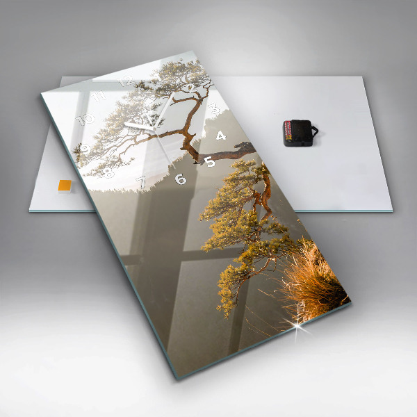 Horloge rectangulaire verticale Un arbre dans les montagnes