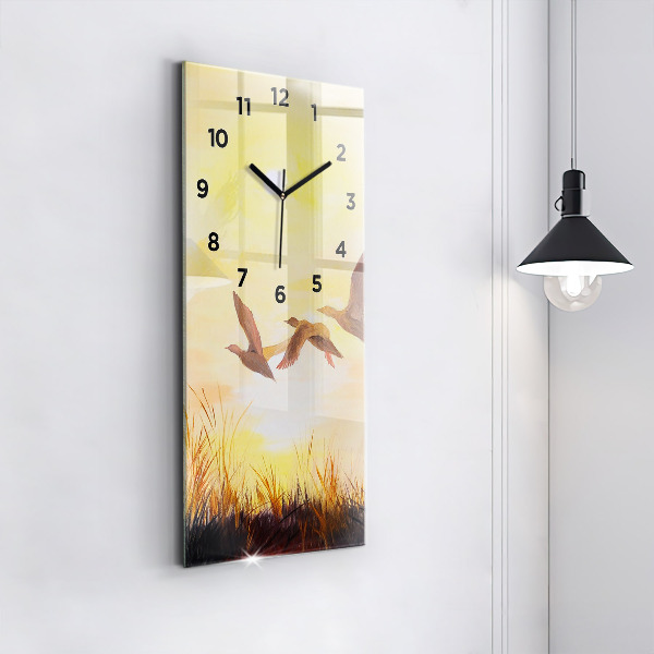 Horloge rectangulaire verticale Grues au coucher du soleil