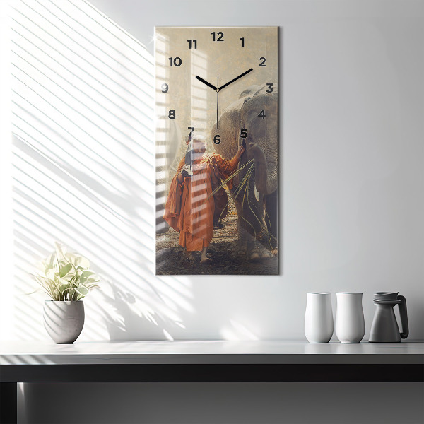 Horloge murale verticale Moine conduisant des éléphants