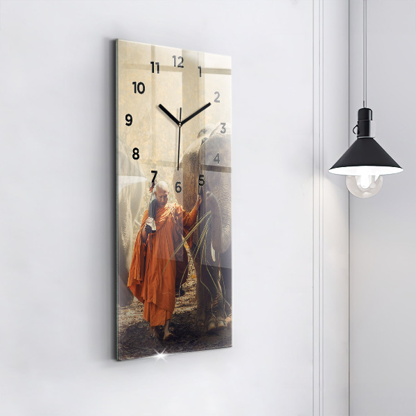 Horloge murale verticale Moine conduisant des éléphants