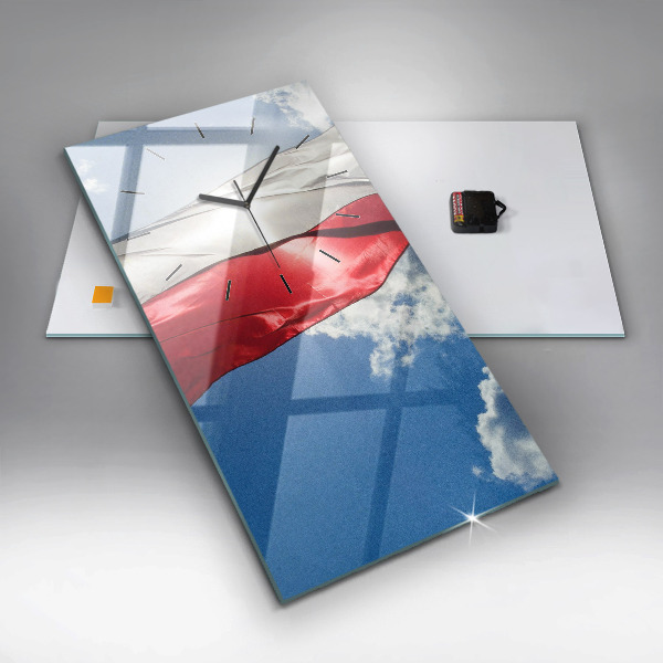 Horloge murale verticale Le drapeau polonais contre le ciel