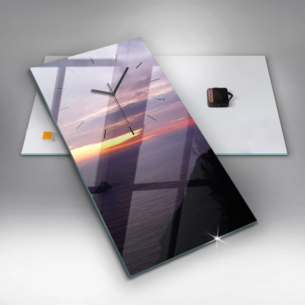 Horloge rectangulaire verticale Tête de pierre