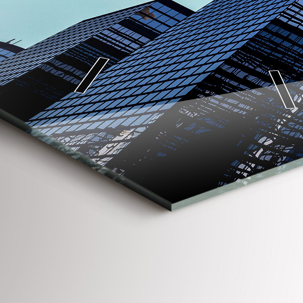 Horloge rectangulaire verticale Avion au-dessus des bâtiments