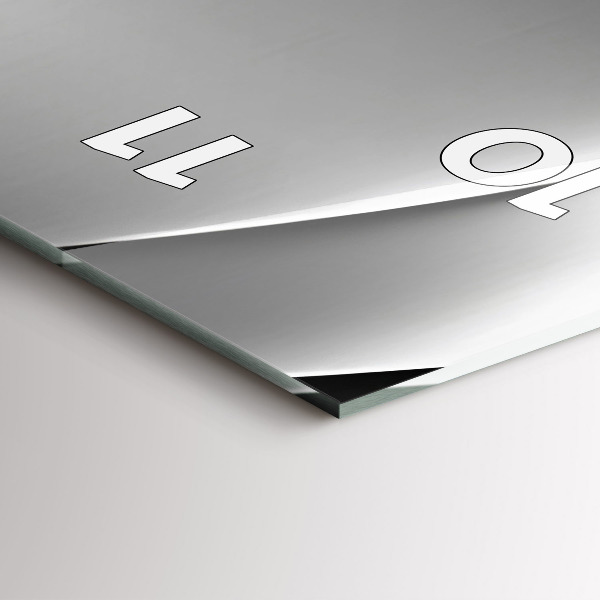 Horloge murale verticale Abstraction argentée