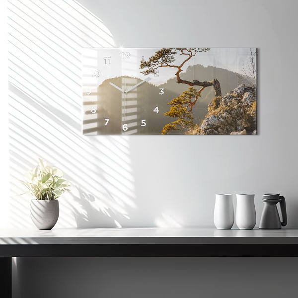 Horloge rectangulaire horizontale Un arbre dans les montagnes