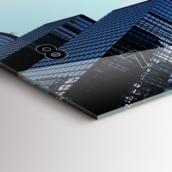 Horloge rectangulaire horizontale Avion au-dessus des bâtiments