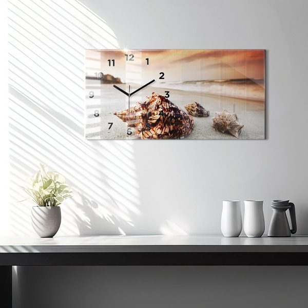Horloge rectangulaire horizontale Un coquillage sur la plage