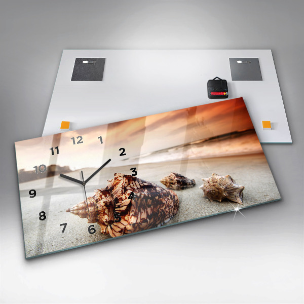 Horloge rectangulaire horizontale Un coquillage sur la plage