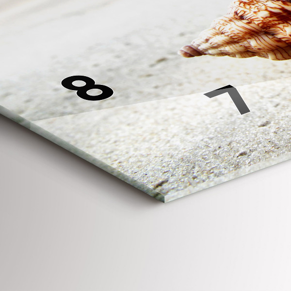 Horloge rectangulaire horizontale Un coquillage sur la plage