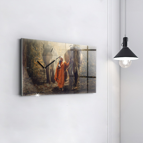 Horloge murale horizontale Moine conduisant des éléphants