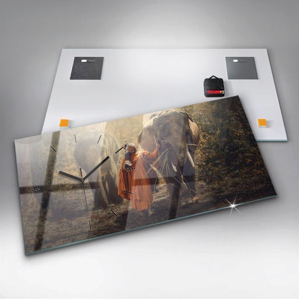 Horloge murale horizontale Moine conduisant des éléphants