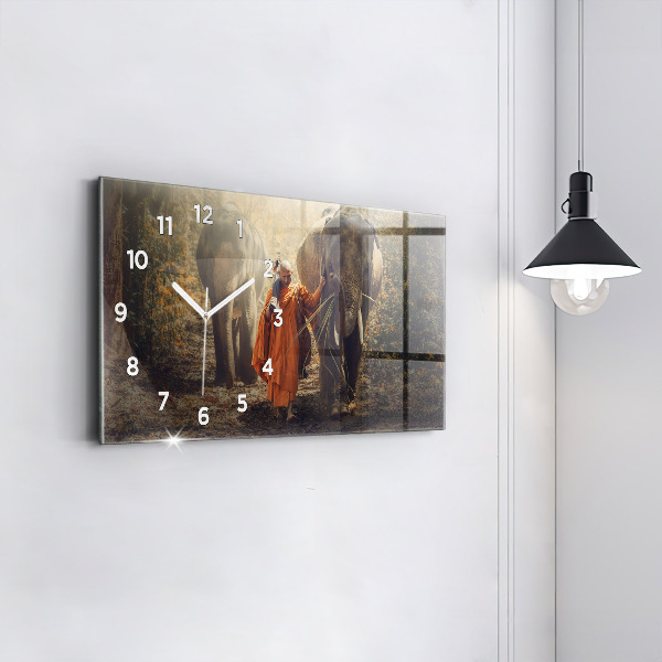 Horloge murale horizontale Moine conduisant des éléphants