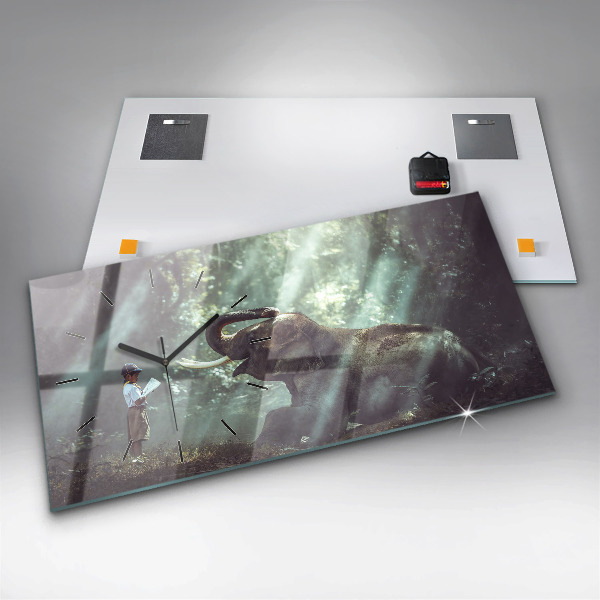 Horloge murale horizontale Un garçon lit un livre