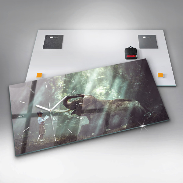 Horloge murale horizontale Un garçon lit un livre