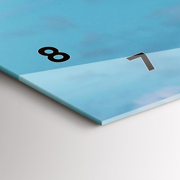 Horloge murale horizontale Grande girafe sur fond de ciel