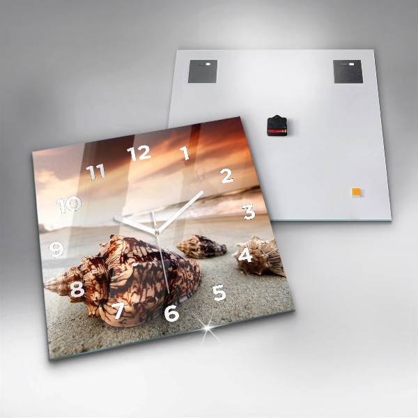 Horloge murale carrée Un coquillage sur la plage