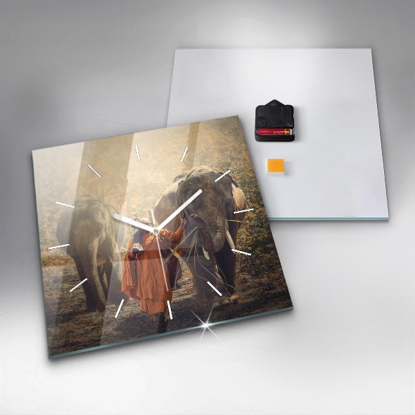 Horloge murale carrée Moine conduisant des éléphants