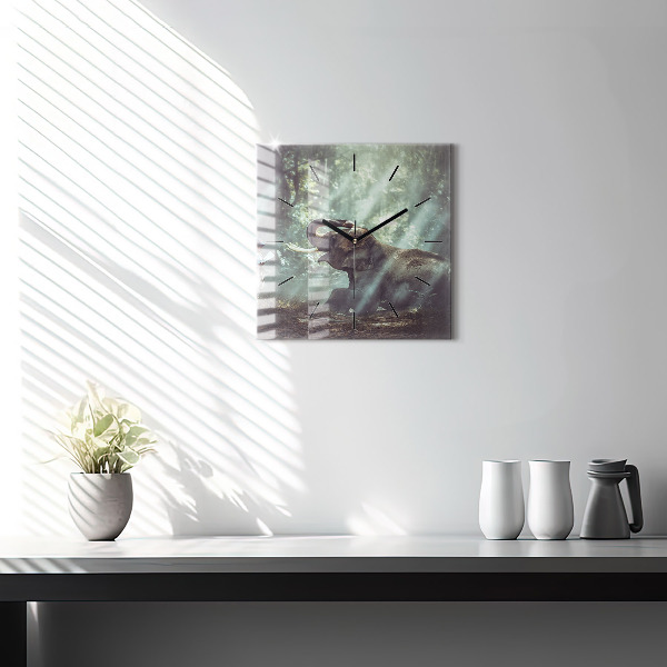 Horloge murale carrée Un garçon lit un livre