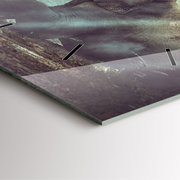 Horloge murale carrée Un garçon lit un livre