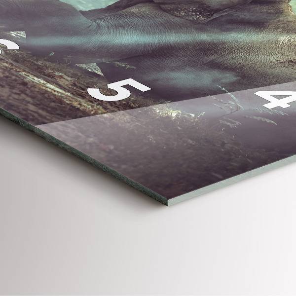 Horloge murale carrée Un garçon lit un livre