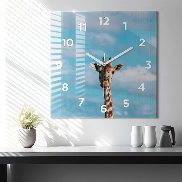 Horloge murale carrée Tête de girafe contre le ciel