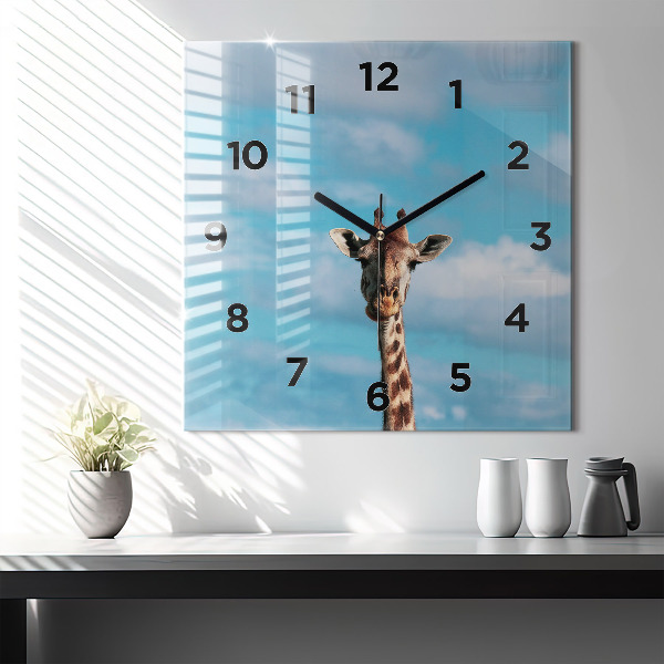 Horloge murale carrée Tête de girafe contre le ciel
