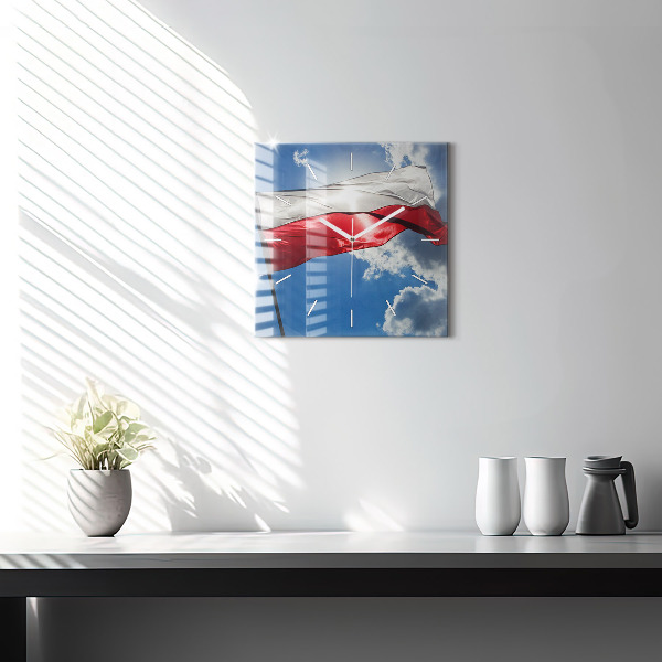 Horloge murale carrée Le drapeau polonais contre le ciel