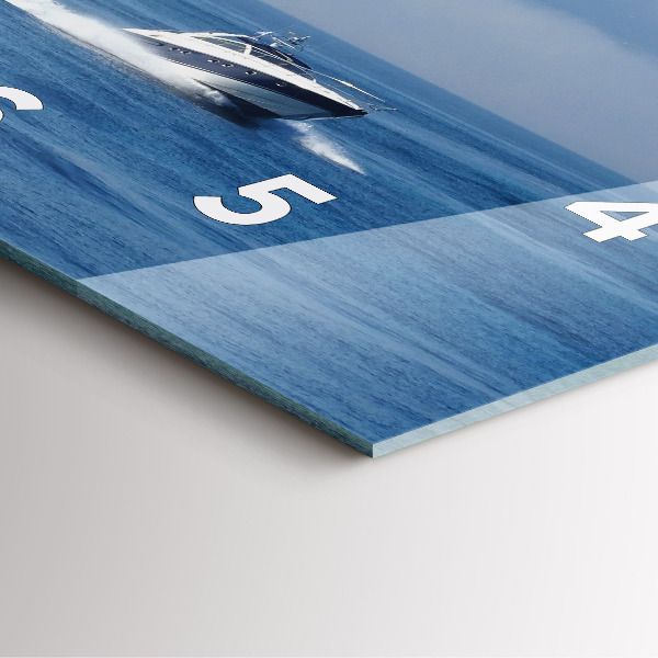 Horloge murale carrée 'Un bateau flottant sur l''océan'